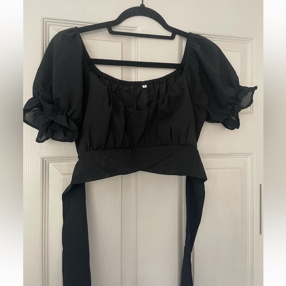 Black tie-top. Never worn. Size Medium from Amazon.